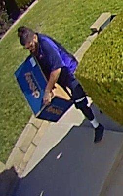 Top knot lazya$$ dropping the package in front of the gate for porch pirates and opportunistic thieves!