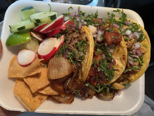 Trio of tacos, chicken, pastor and carne asada! Came with chips, veggies and grilled onions! AMAZING food, DON'T miss this place!