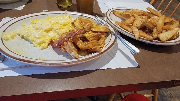 Eggs French toast bacon side of home fries