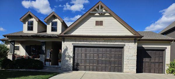 They added a nice brown trim around the garage doors