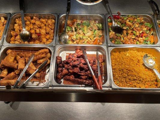 Fried rice, bbq chicken, egg rolls, chicken or beef with veggies.