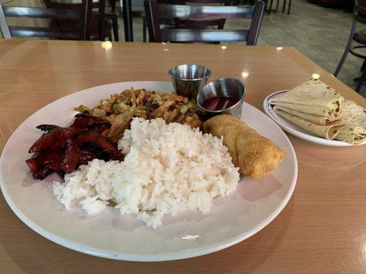 Moo shu chicken with a side of rice, egg roll and boneless ribs.  Very yummy.