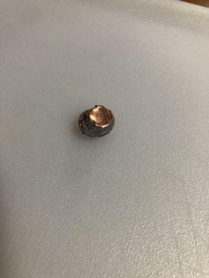 Bullet that was fired through the floor above and into my apartment.