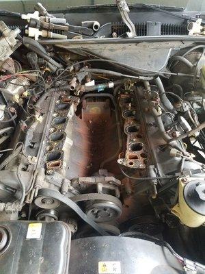 Bad intake manifold causing car to over heat.  And a broken bolt in the head for intake.