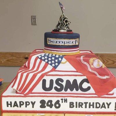 USMC Birthday Ball Cake.  Top tier was a SF Choc Cake, 2d tier was Red Velvet with cream frosting, 3d tier was half vanilla half chocolate.