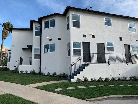 Exterior View #1 - Exterior Paint, Stucco, Epoxy on Stairs, New Windows, Wood Member Replacement & New Roof Installation