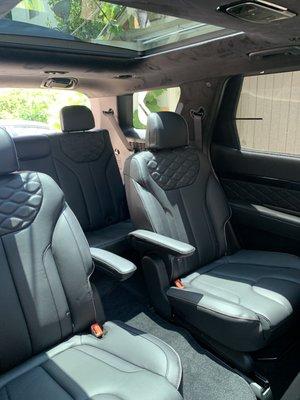 Travel in luxury with double moon roofs, velvet interior, leather seating including satellite radio and extra amenities!