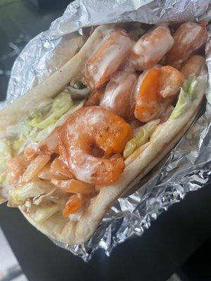 Grill shrimp on pita sandwich