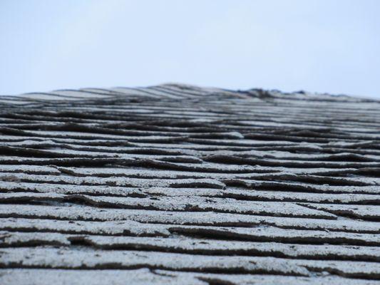 Curling and cupping on a roof is a clear indicator that the roof is past its life expectancy.