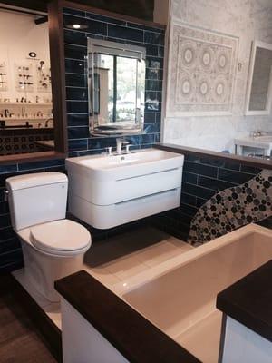 Tiles vignettes throughout the store allow you to see the products in a true bathroom setting.