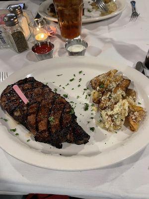 Ribeye steak and kat's house potatoes.