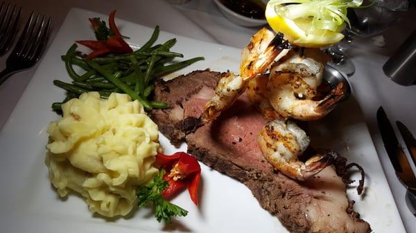 14oz Prime Rib rolled in black pepper w/six jumbo grilled shrimp. Very delicious steak!