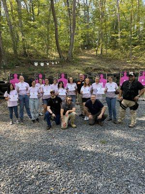 A remarkable group of ladies learning the fundamentals of firearms.