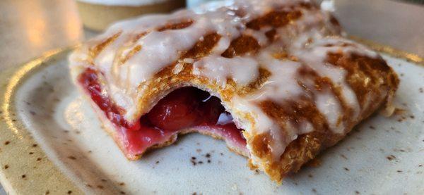 Glazed cherry pastry.