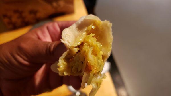 Interior of veggie momo, vegan by default ($10). Nicely seasoned cabbage.