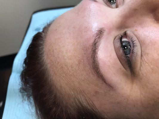 Feather eyebrows with microblading and Shading.