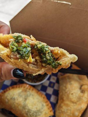 Breakfast empanada with chimichurri.