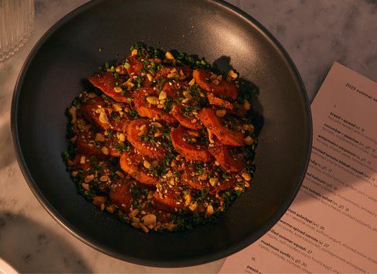 shawarma-spiced carrots (v) 

carrot purée, kale tabbouleh, pomegranate vinaigrette, peanut dukkah