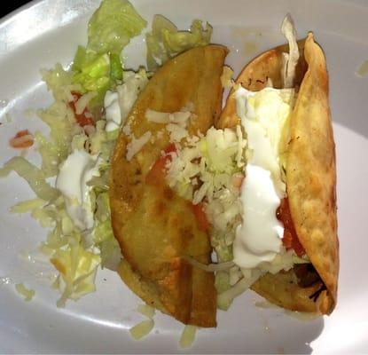 Beef and chicken dorado tacos