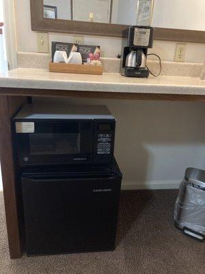 microwave and refrigerator in the room