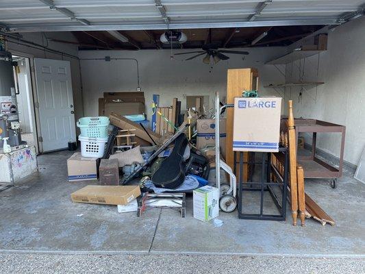 This is the pile of items these movers were hired to move but instead left behind in the home!