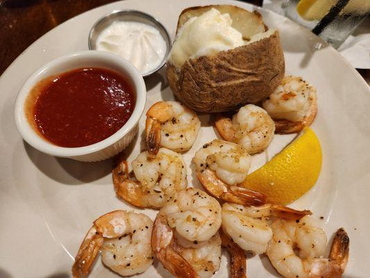 Okay shrimp with a weird cocktail sauce. The baked potato was good.