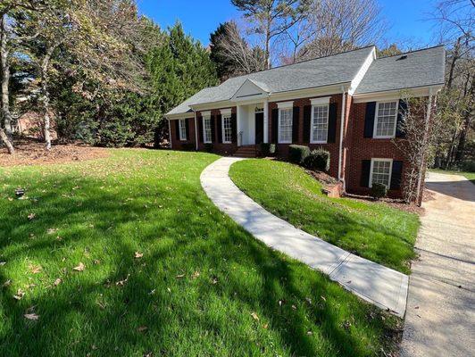 Here' a front lawn and walkway we totally reworked! Demo of old walkway, grading, amending, seeding, concrete.