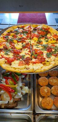 margarita pizza in top pic and sausage with peppers and onions bottom left and arancin on the right (aka rice balls)