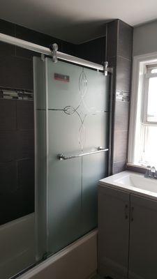 Showered sliding glass doors