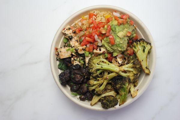 Balanced Bowl: Festival Rice, Baby Spinach, Roasted Mushrooms, Roasted Lemon Garlic Broccoli, Sweet Chili Tofu and Avocado Salad.