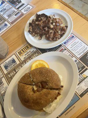 Bacon, egg and cheese on wheat bagel with a side of corn beef hash well well done