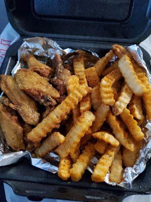 Lemon pepper hot honey 10 pc wings with fries (fries were cooked a little over)