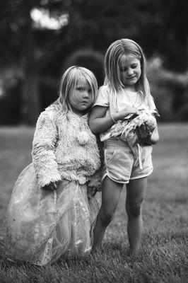 Sisters and their chicken.