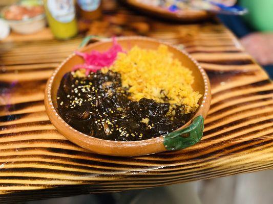 Oxacan Mole with rice and pickled onions