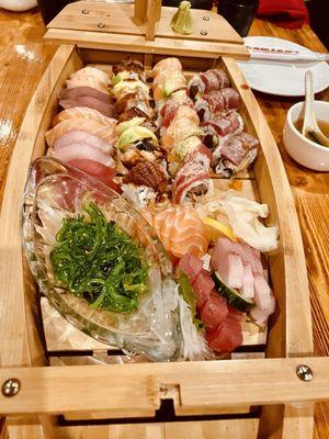 Ohjah Boat, It came with 3 kinds of special rolls and 12 pieces of Sashimi and many pieces of Nigiri and Seaweed Salad.