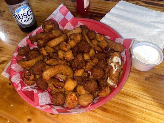 Combo Appetizer with fried mushrooms, cheese balls, onion rings, and cheese sticks.