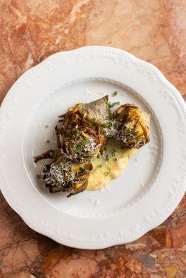 Gently fried baby artichokes done the Jewish way -- "Carcioffi alla Giudia" -- with pecorino and aioli.