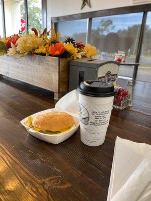 Sausage egg & cheese croissant w/honey latte.