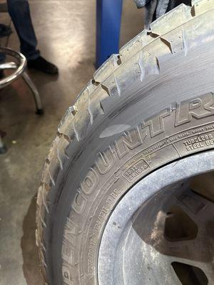 Damage to tire caused by the faulty install at a different shop