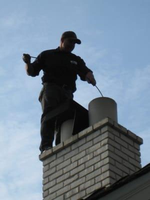 Chimney being cleaned