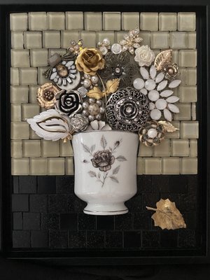 Mosaic made with glass and found objects