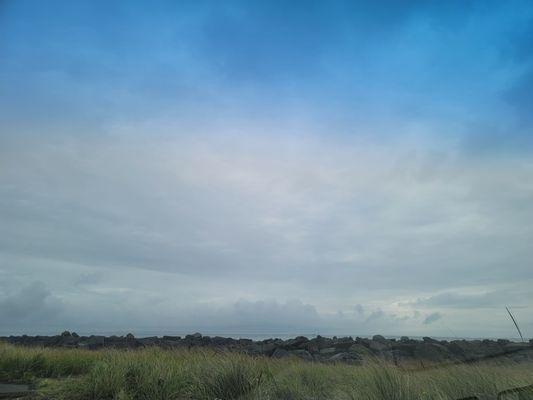 View from the parking area. Can see the waves crashing on the rocks at times.