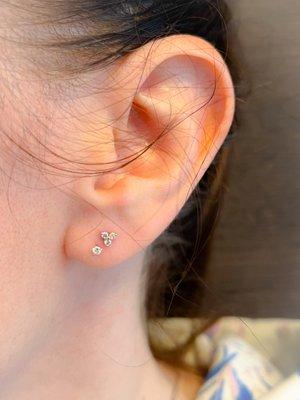 14k cz tri-stone w/ 2mm cz in old piercings done in childhood