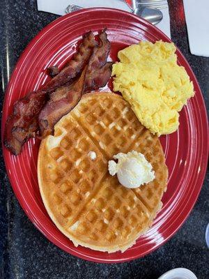 My favorite crisp and fluffy waffle with scrambled eggs and bacon.