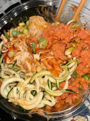 sushi rice & zucchini noodles, with spicy kani, spicy tuna, edamame, corn, sweet chili, sriracha, green onion, & sesame seed (mixed)