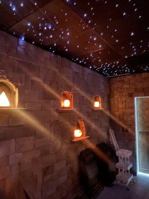 Salt room. Halotherapy! Salt lamp niches in a stunning rock room with a fiber optic ceiling of stars. Must see.