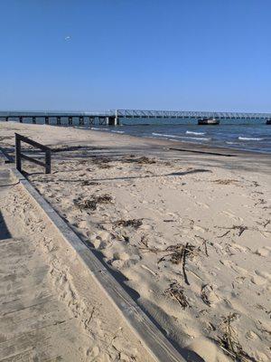 Strolling down the boardwalk towards the pier.