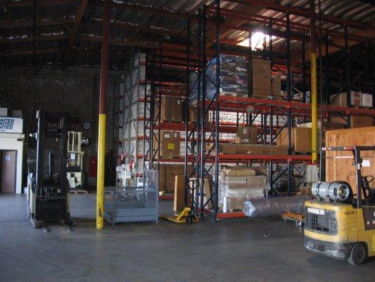 Records Storage, Pallet Storage, Household Goods Storage in a clean safe and organized warehouse.