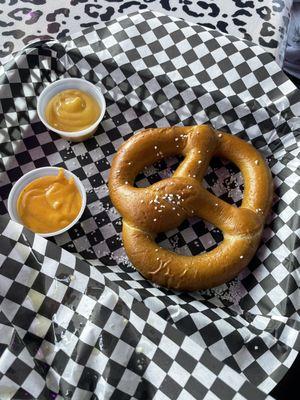 Soft pretzel with cheese and honey mustard