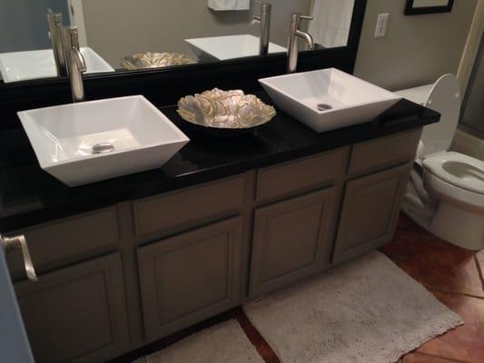 Another Granite Countertop with Dual White Vessel Sink and Faucets